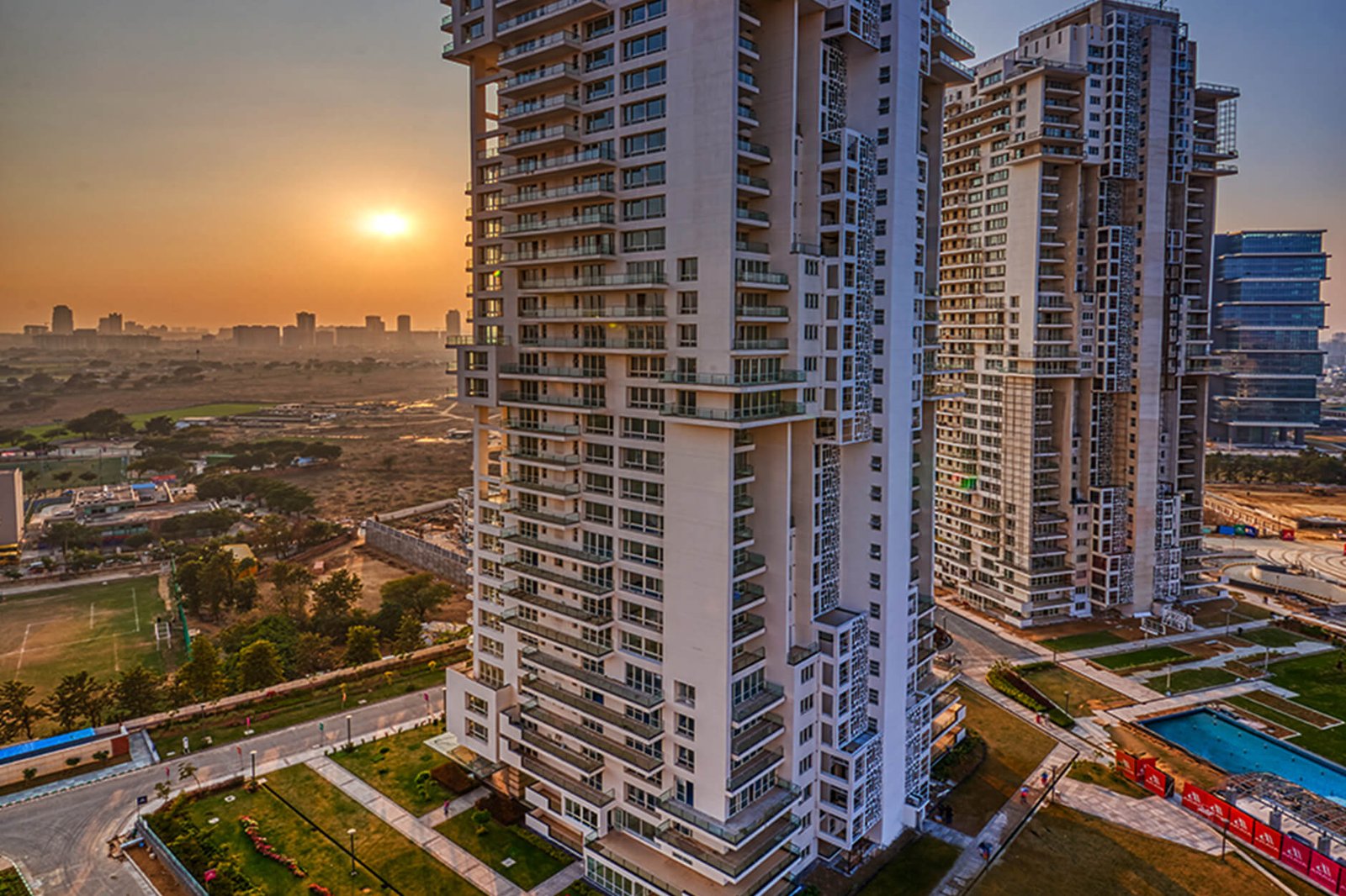 Residential towers in Gurugram at sunset
